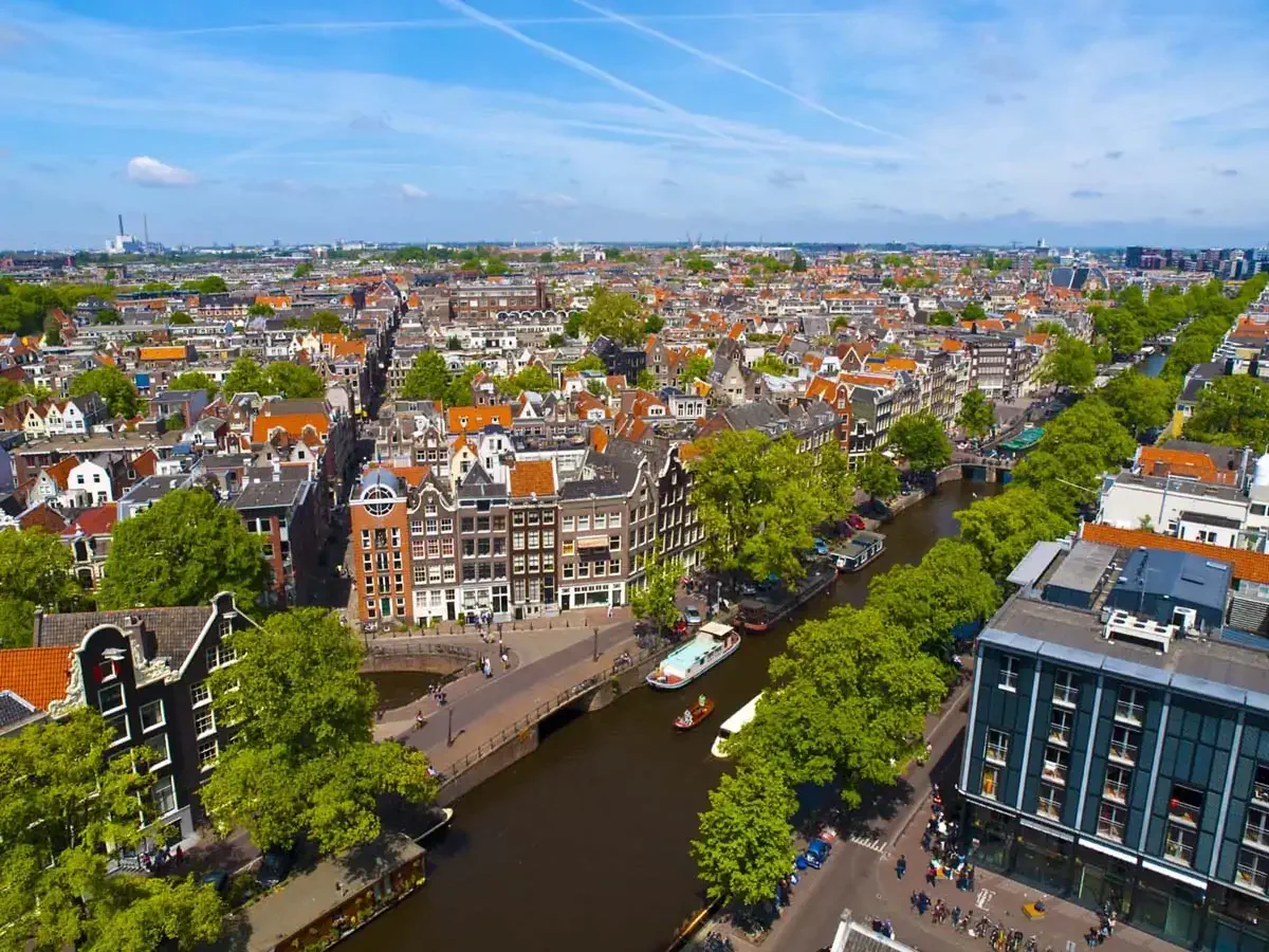Aerial view of Amsterdam city in a beautiful sunny day.