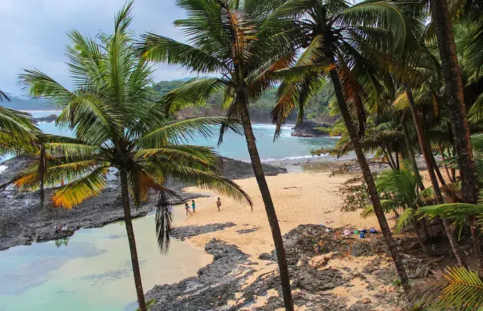 Beautiful beach Piscina with volcanic rocks and clear water in Sao Tome and Principe Island, in Africa; Shutterstock ID 723292762